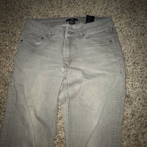 Light grey skinny jeans